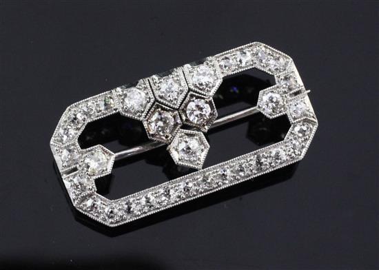 A 1920s/1930s platinum and diamond brooch, approx. 1.25in.